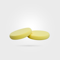 Two yellow polishing pads on a white background