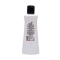 A white plastic bottle of Fabrin All Purpose Skin Care cleanser with a black cap, shown from the back to display the label details against a white background.