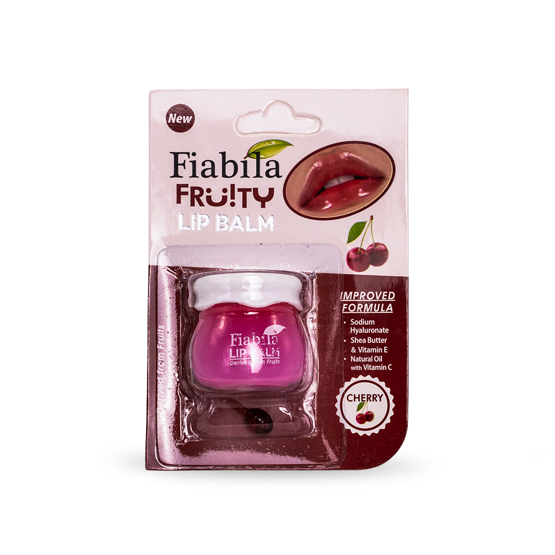 Fiabila Fruity Lip Balm in Cherry flavor, packaged in a pink and dark red blister card with a small jar of pink balm visible inside.