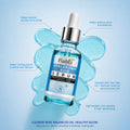 Fiabila Hyaluronic Acid Serum in a clear glass dropper bottle with a blue label and silver cap, centered on a light blue background with decorative liquid splash and callout text.