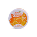 A round white container of Fiabila Nail Polish Remover in Citrus Scent, featuring a label with orange slice graphics and text indicating 32 pads and acetone-free formula.