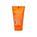 Orange sunscreen cream tube with label on a white background