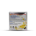 A silver rectangular box of FL 003 Whitening Soap 80g, featuring yellow floral illustrations and product details in red and blue text, set against a plain white background.