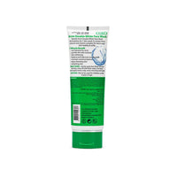Green face wash tube with label on a white background