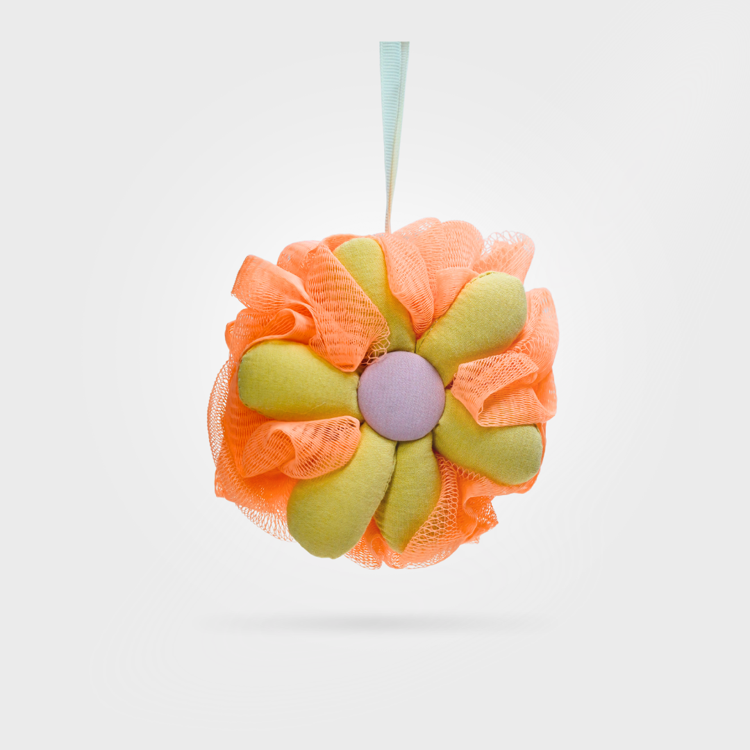Decorative flower ornament with orange and green petals on a white background