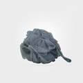 Gray mesh scrubber on a light gray background