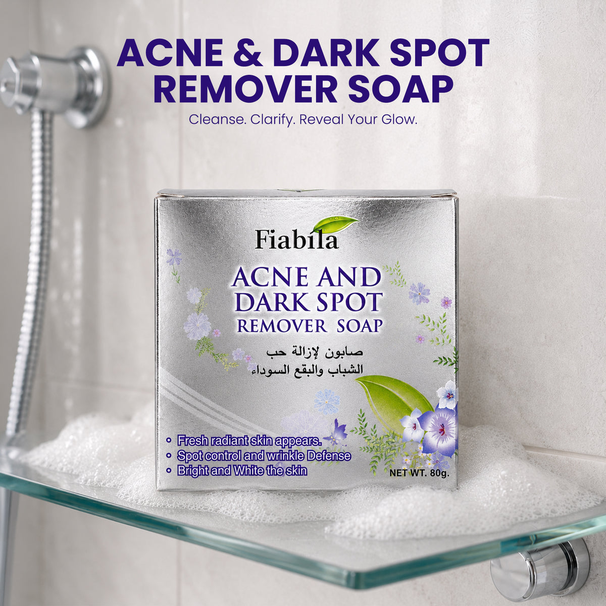 Fiabila Acne and Dark Spot Remover Soap box displayed on a glass shelf in a shower setting with soap bubbles, under the text 'ACNE & DARK SPOT REMOVER SOAP'.