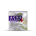 Fiabila Acne Clear Soap box, 80g, featuring a metallic silver packaging with purple and white text, and botanical illustrations on a white background.