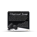 A rectangular black box of Charcoal Soap with white text and a photo of a piece of charcoal on the front, shown on a clean white background.