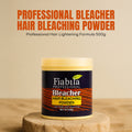 A 500g tub of Fiabila Professional Bleacher Hair Bleaching Powder, displayed on a rustic wooden block against a beige background with promotional text at the top.