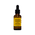 An amber glass dropper bottle with a black cap and a yellow label, shown against a plain white background.